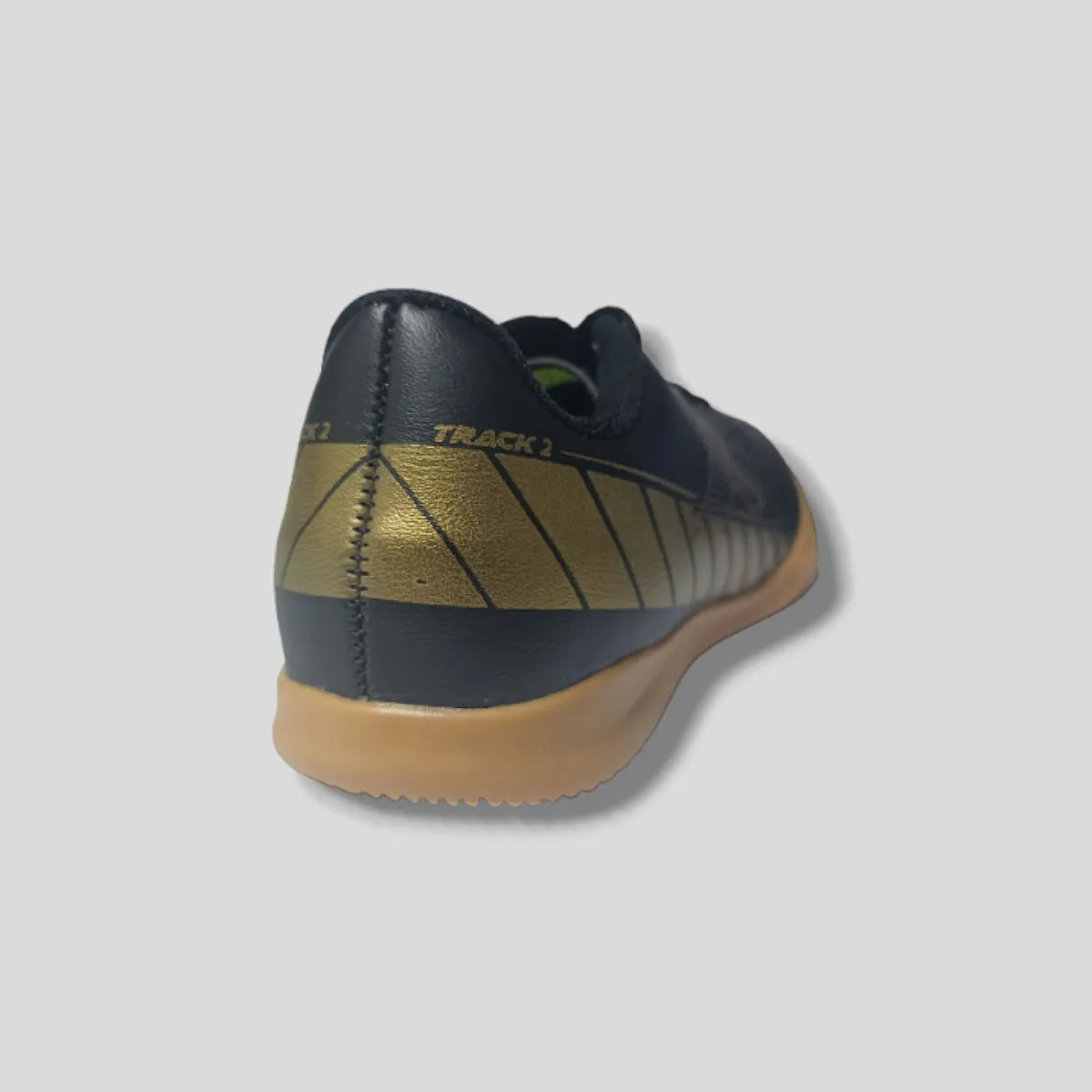 Chuteira OXN Track 2 Indoor Pro Preta/Dourada